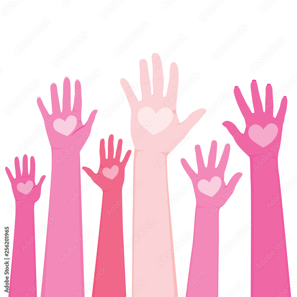 Raised up human hands in different shades of pink and heart on palm international volunteer day concept Raised up human hands in different shades of pink and heart on palm international volunteer day concept