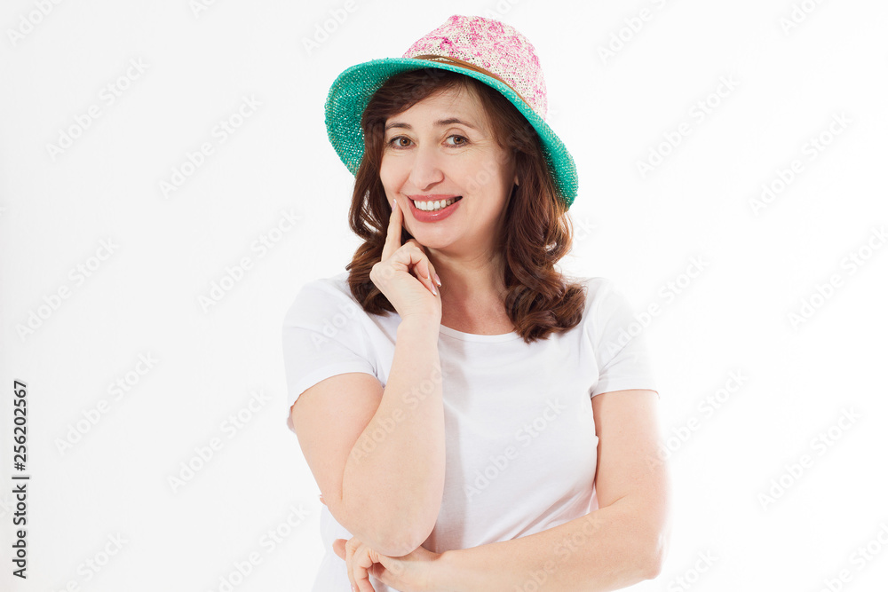 Happy woman in summer hat isolated on white background. Sun protection skin care and vacation holidays concept. Middle age female with white healthy teeth and menopause. Travel vacation. Copy space Happy woman in summer hat isolated on white background. Sun protection skin care and vacation holidays concept. Middle age female with white healthy teeth and menopause. Travel vacation. Copy space
