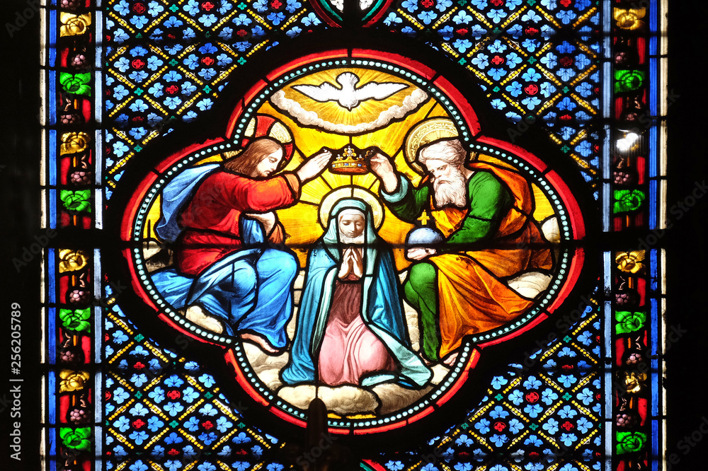 Crowning of the Virgin Mary, stained glass window in the Basilica of Saint Clotilde in Paris, France 