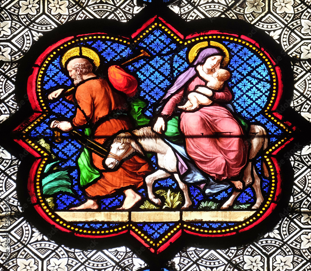 Flight to Egypt, stained glass window in the Basilica of Saint Clotilde in Paris, France 