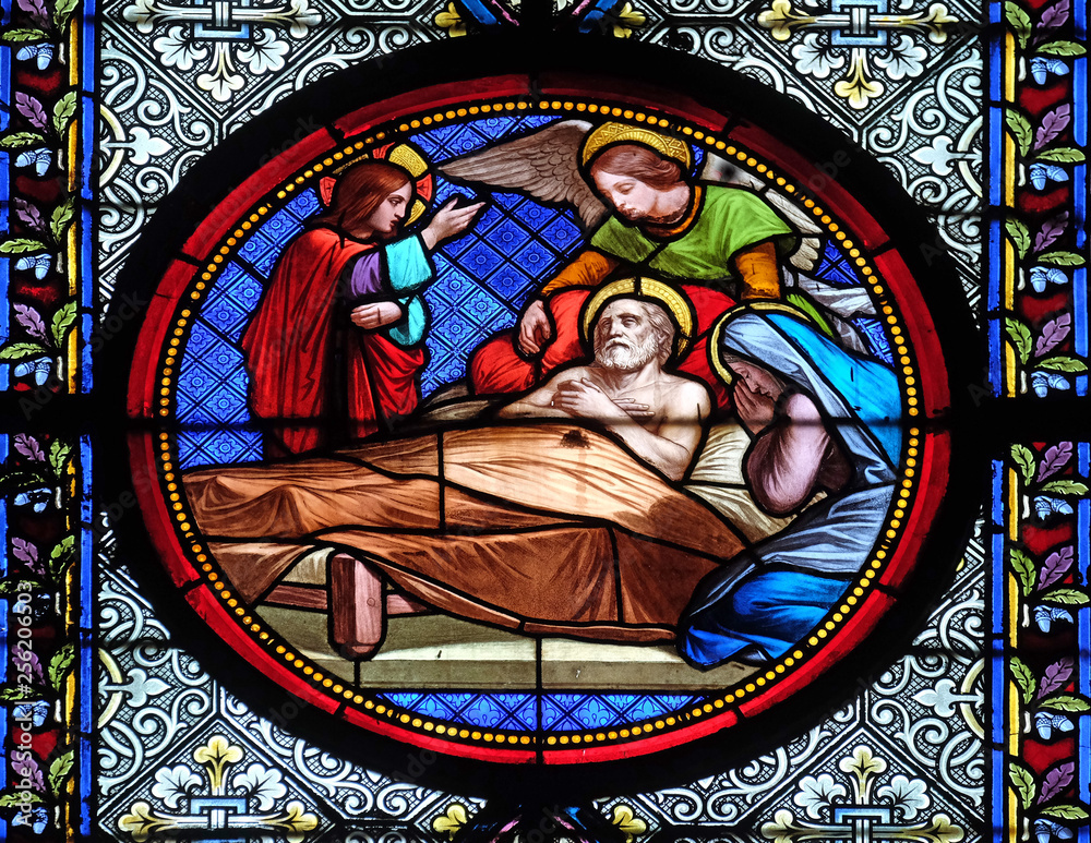 Death of Saint Joseph, stained glass window in the Basilica of Saint Clotilde in Paris, France 