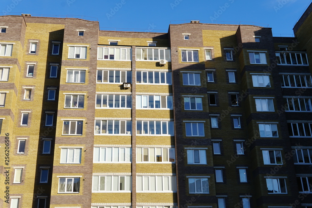 Modern condominium building real etate in city with blue sky