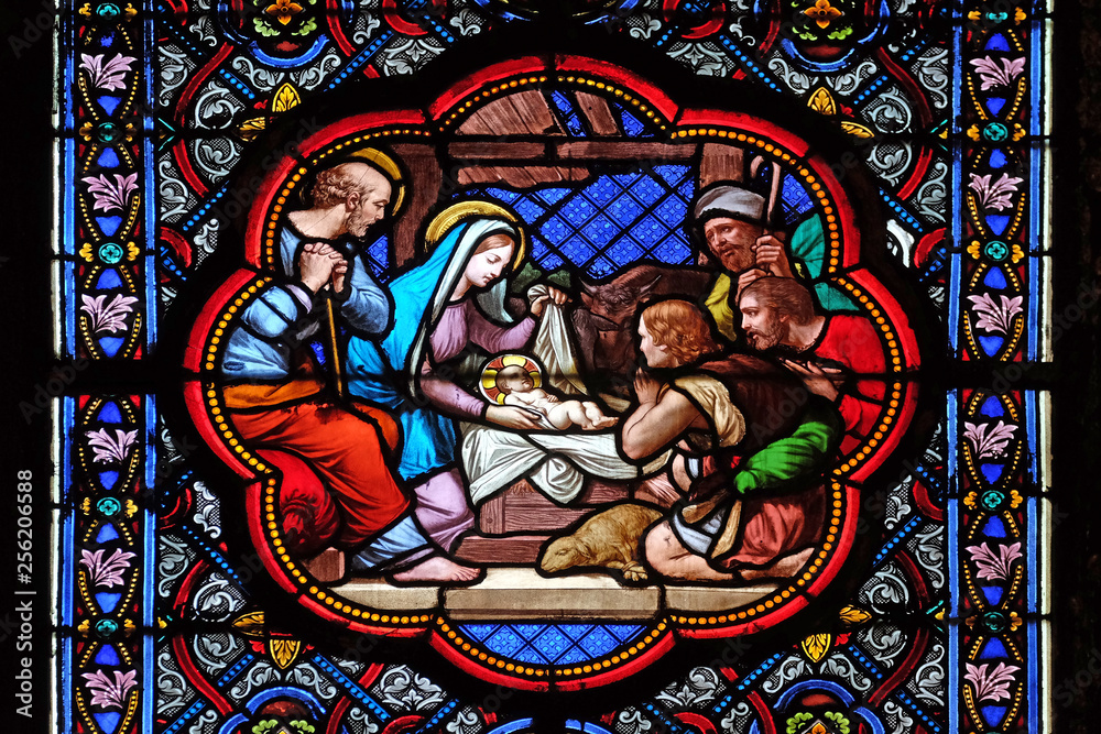 Nativity Scene, Adoration of the Shepherds, stained glass window in the Basilica of Saint Clotilde in Paris, France