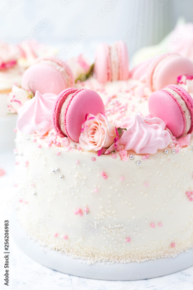 Wedding white cake with macarons and roses Wedding white cake with macarons and roses