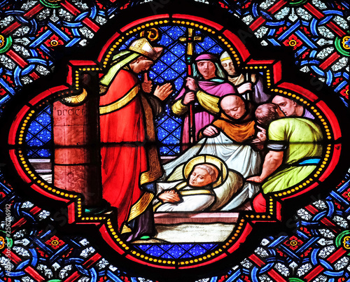 Burying of Saint Remi, stained glass window in the Basilica of Saint Clotilde in Paris, France
