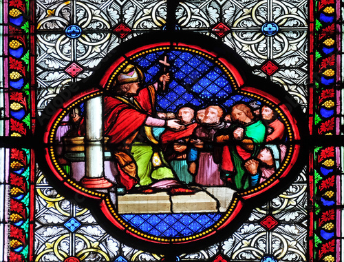 Saint Remi, stained glass window in the Basilica of Saint Clotilde in Paris, France