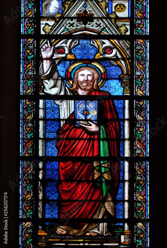 Christ blessing, stained glass window in the Basilica of Saint Clotilde in Paris, France