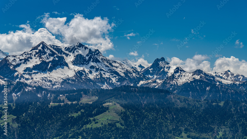 Switzerland, wonderful view on snow Alps near Beatenberg village Switzerland, wonderful view on snow Alps near Beatenberg village
