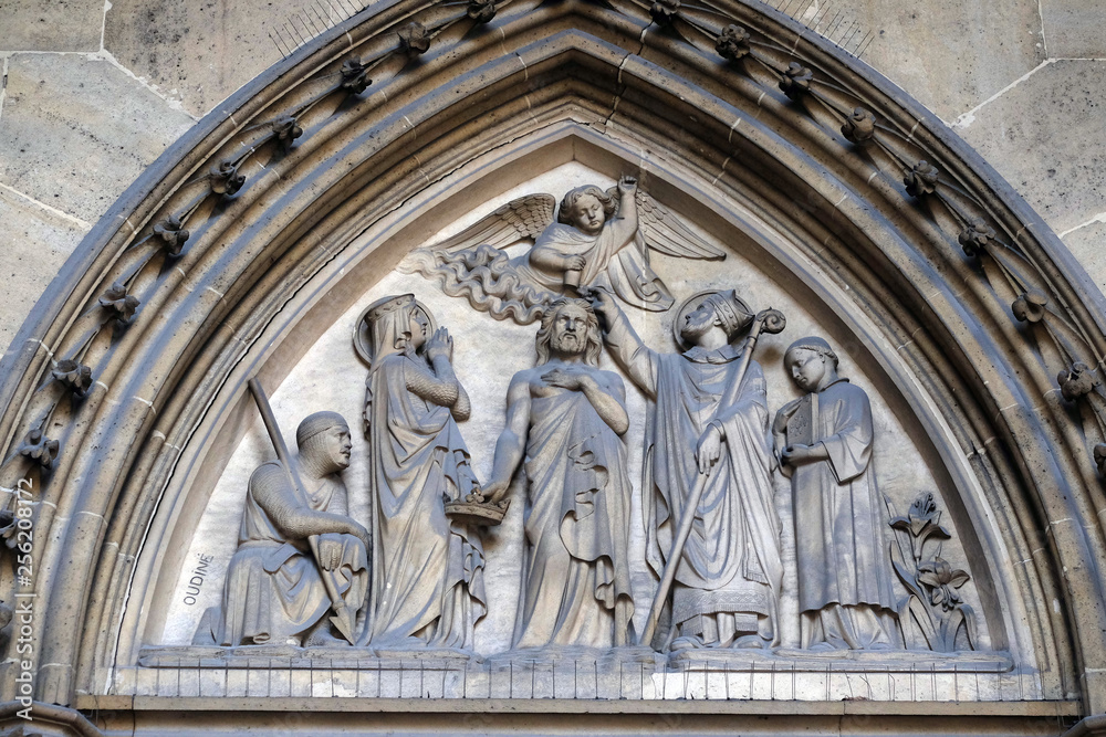 Bass relief on the portal of the Basilica of Saint Clotilde in Paris, France 