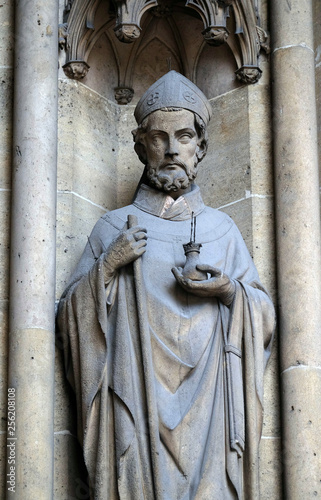Statue of Saint on the portal of the Basilica of Saint Clotilde in Paris, France 