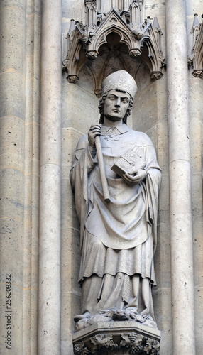 Statue of Saint on the portal of the Basilica of Saint Clotilde in Paris, France