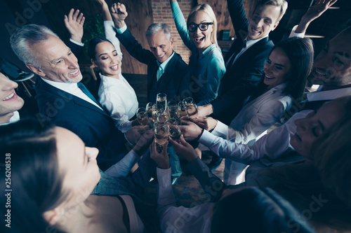 Close up top above high angle photo business people different age race she her he him his excited amazed company hands arms raised up golden wine friendship friends formal wear jackets shirts