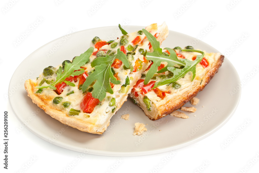 two slices of quiche with vegetables 