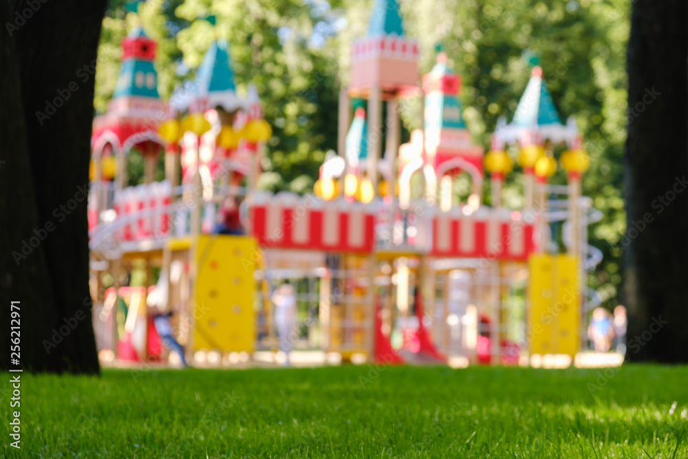 Colorful playground on yard in the park. Fun childhood Colorful playground on yard in the park. Fun childhood