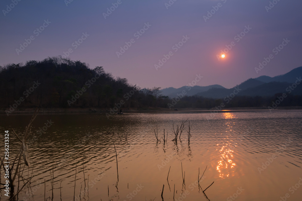 Fototapeta premium Villagers are catching fish by fish trap (net trap) in reservoir