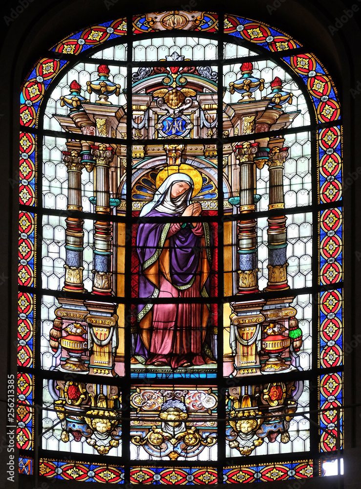 Virgin Mary, stained glass windows in the Saint Roch Church, Paris, France 