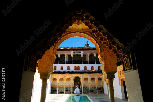 Wedding couple posing in old arabic house