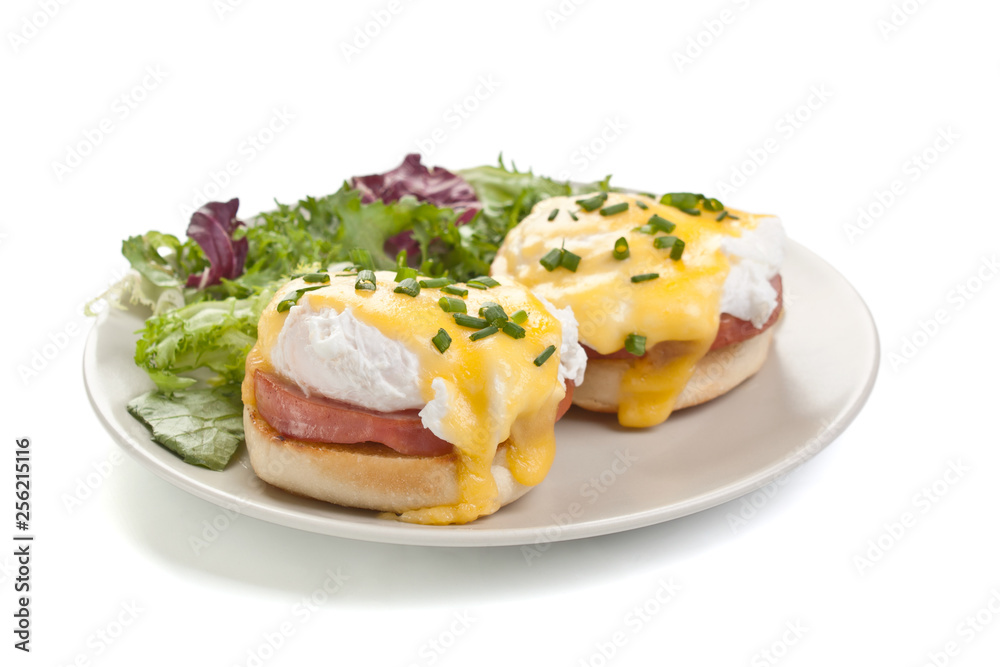 Eggs Benedict- toasted English muffins, ham, poached eggs and hollandaise sauce Eggs Benedict- toasted English muffins, ham, poached eggs and hollandaise sauce