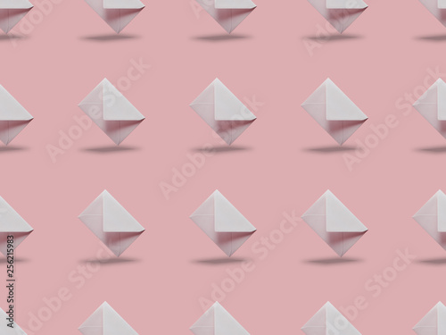 flat lay with white and empty envelopes on pink background with copy space