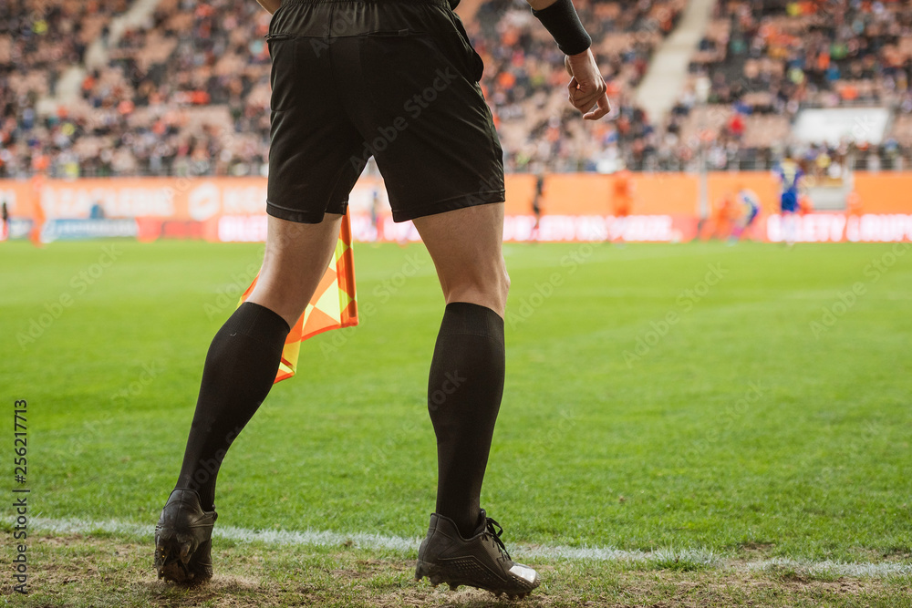 Assistant of football referee during the match. Assistant of football referee during the match.