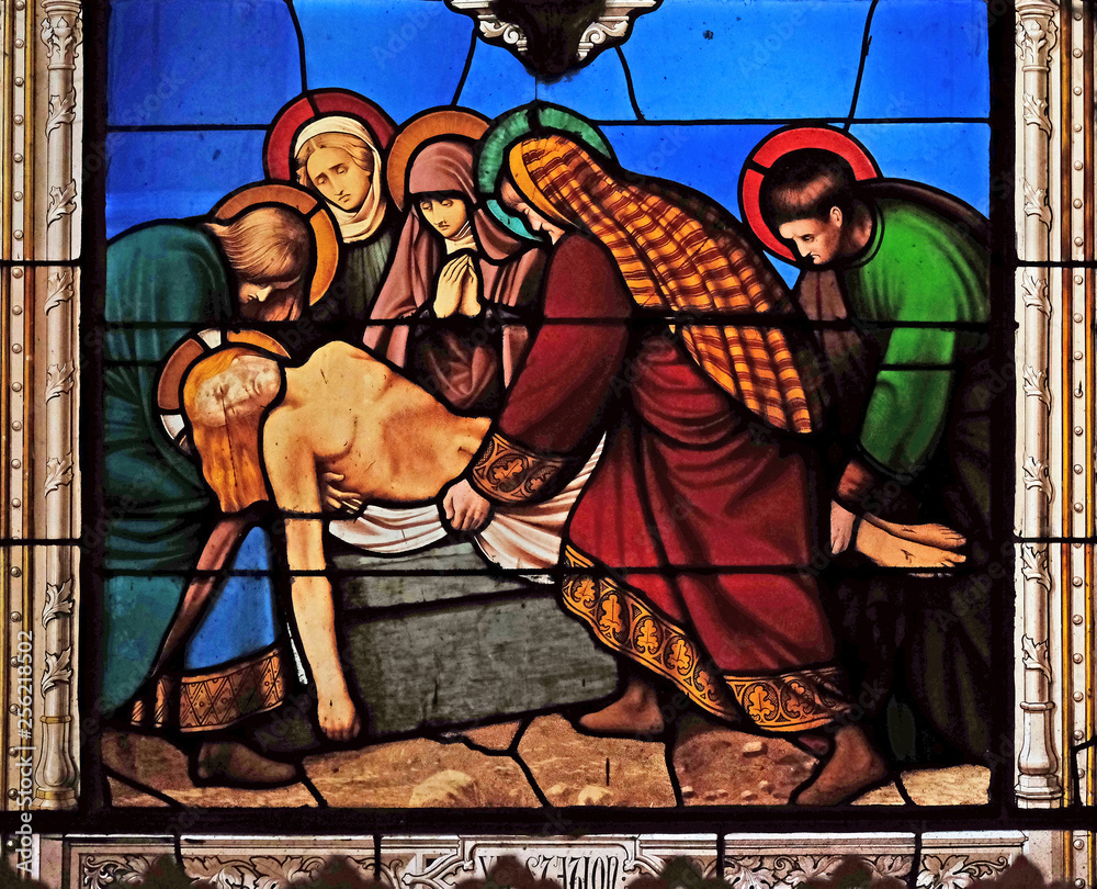 14th Stations of the Cross, Jesus is laid in the tomb and covered in incense, stained glass windows in the Saint Eugene - Saint Cecilia Church, Paris, France 