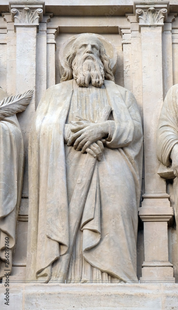 Apostle, statue on the facade of Saint Augustine church in Paris, France 