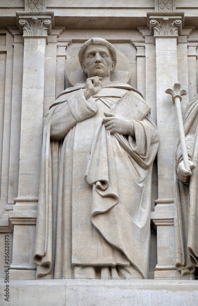 Saints Dominic, statue on the facade of Saint Augustine church in Paris, France 