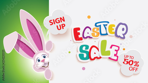 Easter sale web banner with pink Easter Bunny next to textual signboard isolated on a green background