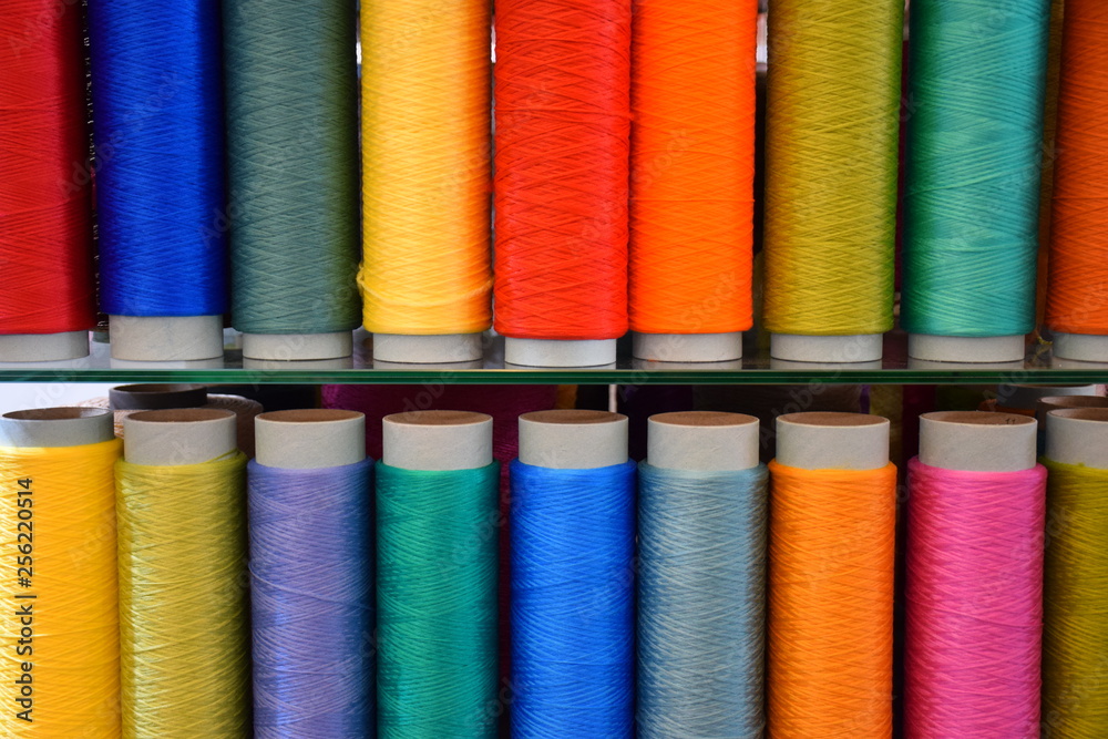 Large colorful polypropylene thread set in rainbow mood. Multicolor bobbin thread. Polypropylene multifilament yarns. Set of sewing thread coils, miscellaneous colours. Large colorful polypropylene thread set in rainbow mood. Multicolor bobbin thread. Polypropylene multifilament yarns. Set of sewing thread coils, miscellaneous colours.
