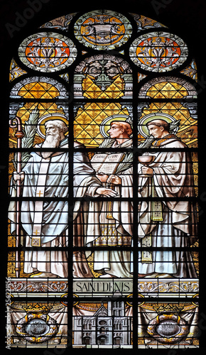 Saint Denis, stained glass window in the Saint Augustine church in Paris, France