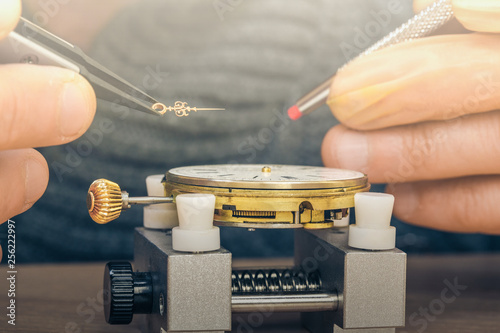 Fotografie Professional watchmaker repairing watch