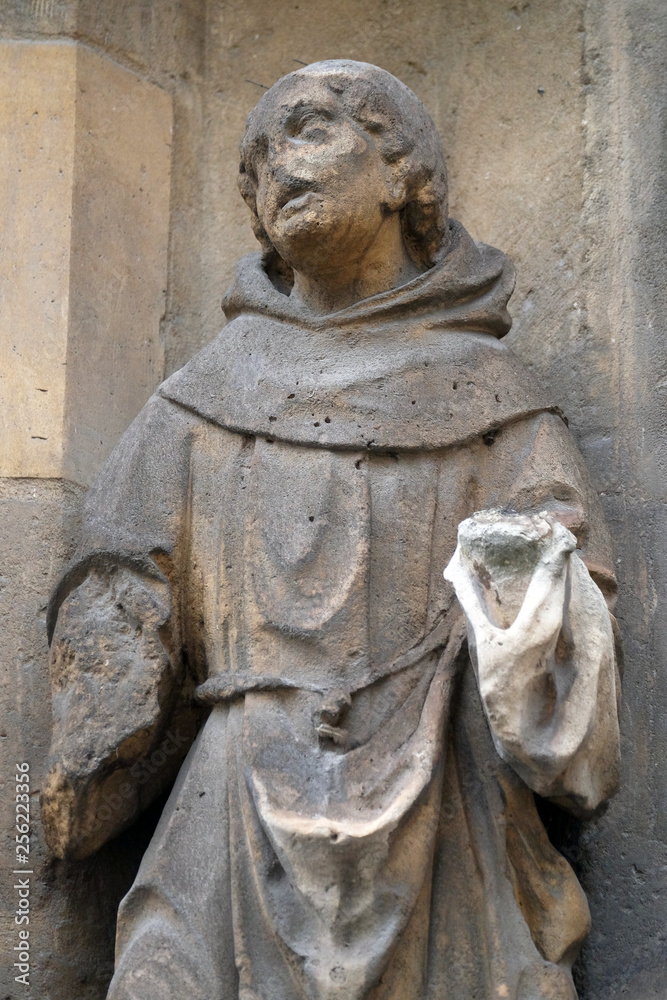 Statue of Saint on the portal of the Saint Germain l'Auxerrois church in Paris, France 