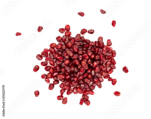 Peeled red pomegranate on white background