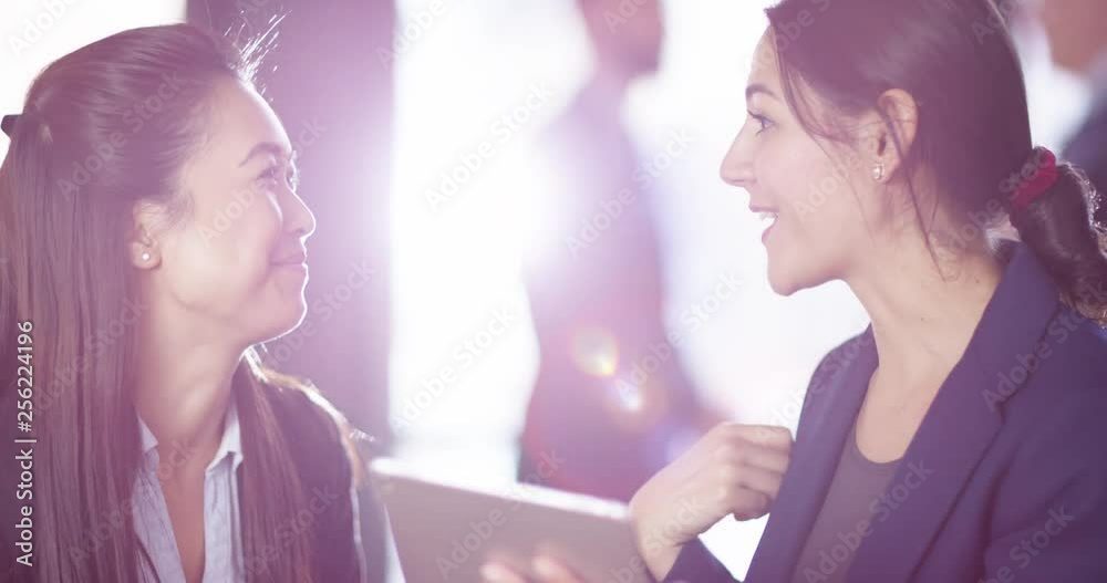 4K Excited professional woman having a discussion with party event planner. Slow motion.