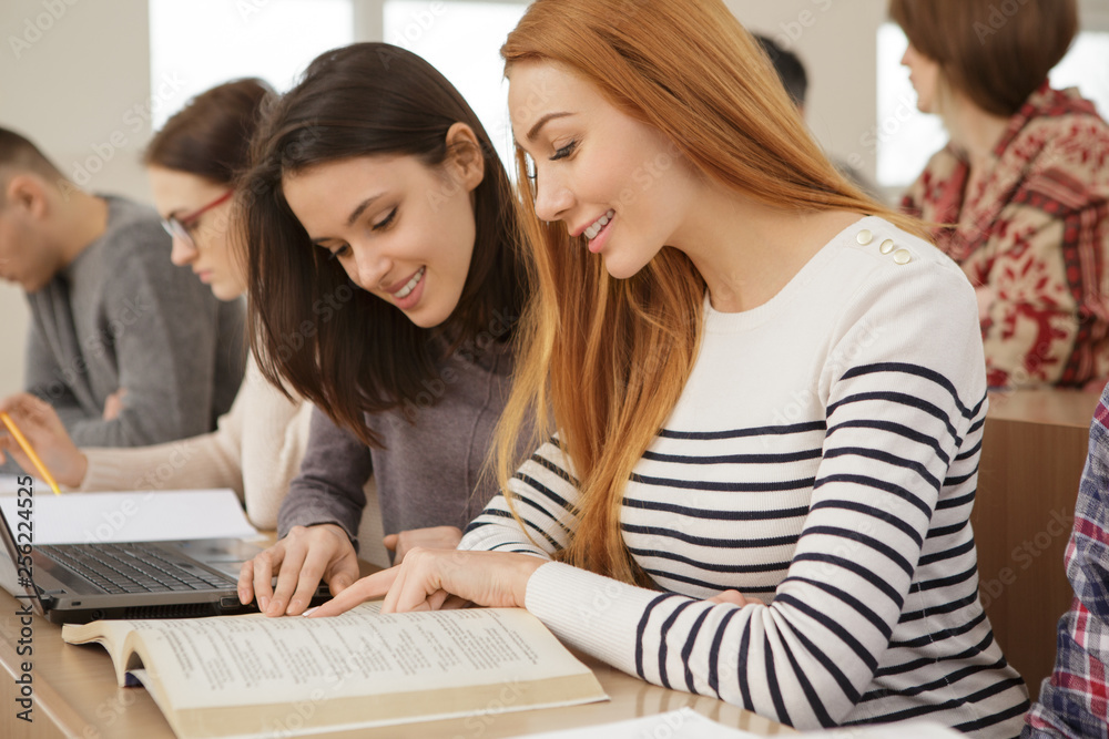 University students working on a project together
