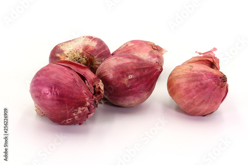 Shallots are ingredients in Thai curry.Shallots are Thai food and Thai herbs.Shallots are food that nourishes blood.isolated on white background.