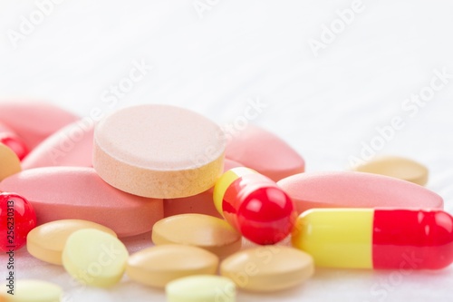 Medicine pill on white, medical tablet prescription,  pharmacy drug.