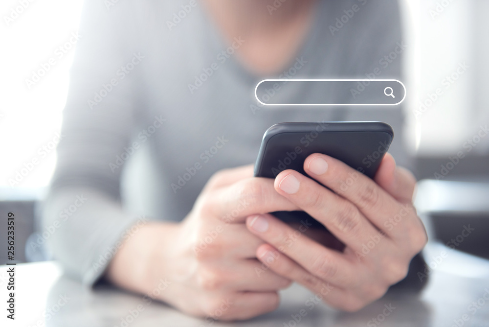 Closeup woman hands using mobile phone with Searching Browsing Internet Data Information Networking Concept, copy space. Closeup woman hands using mobile phone with Searching Browsing Internet Data Information Networking Concept, copy space.