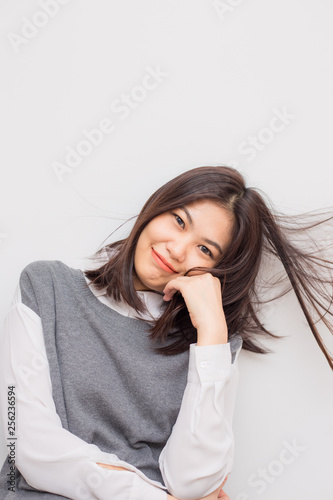 Beautiful smiling asian cute women post on white background