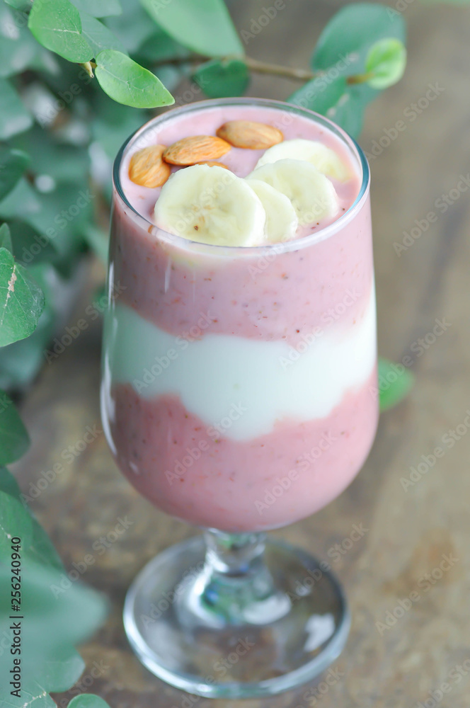 strawberry smoothie or strawberry yogurt with banana topping