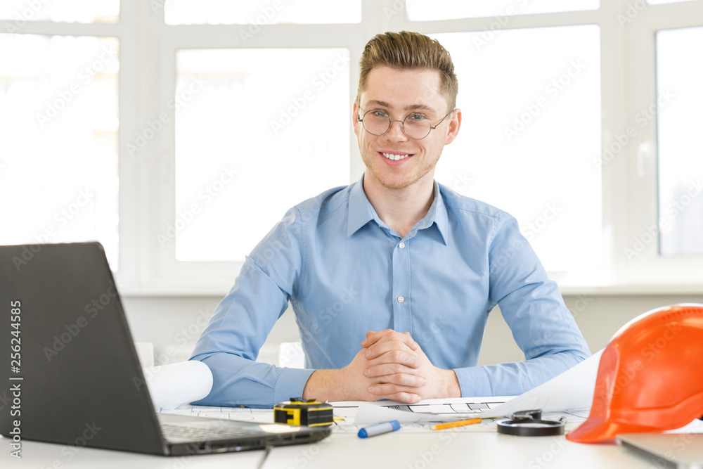Young businessman working at the office