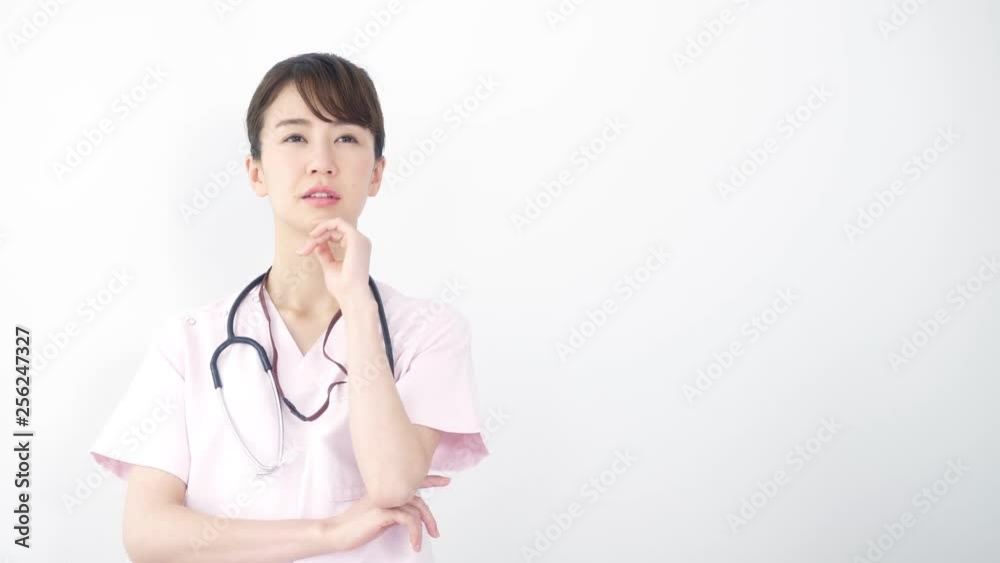 悩む医師