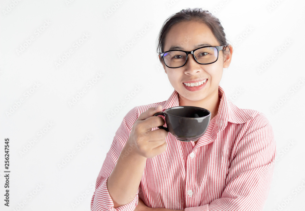 Close up portrait of confident Asian woman, wearing glasses and holding coffee cup, looking camera and smile, standing over white background with copy space. Close up portrait of confident Asian woman, wearing glasses and holding coffee cup, looking camera and smile, standing over white background with copy space.