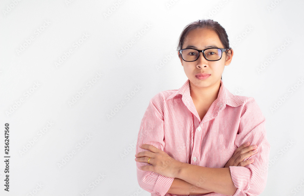 Asian woman wearing glasses standing and cross one's arm isolated on white background. Asian woman wearing glasses standing and cross one's arm isolated on white background.