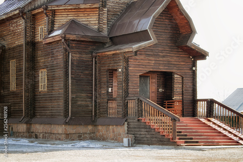 The entrance to the Church.Pokrovsky church in Ust-Kamenogorsk. Christian architecture. Wooden church. 