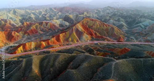 Aerial 4k drone footage of most colorful mountains on earth, the Rainbow mountains of Zhangye. Shown is the most vibrant, multicolored part of this amazing landscape located in Gansu, China. 