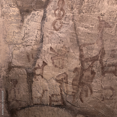 drawings of ancient man on the wall of the cave. history of antiquities, archaeology.