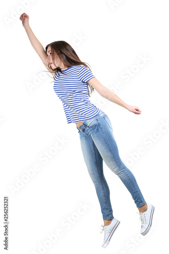 Jumping beautiful girl on white background