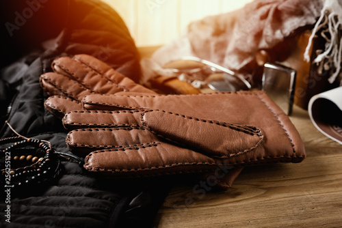 closeup brown leather gloves