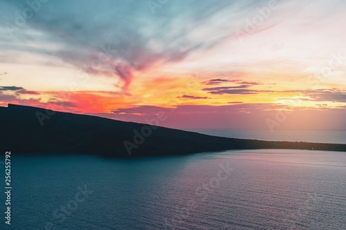 Colorful sunset above Santorini island, Oia, Greece